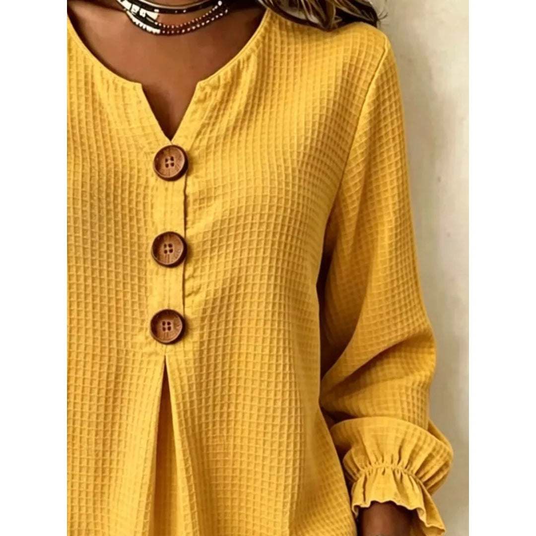 Women's waffle knit long sleeve top with ruffle detail