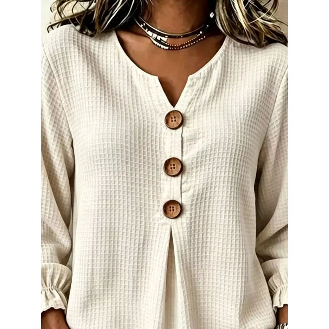 Women's waffle knit long sleeve top with ruffle detail