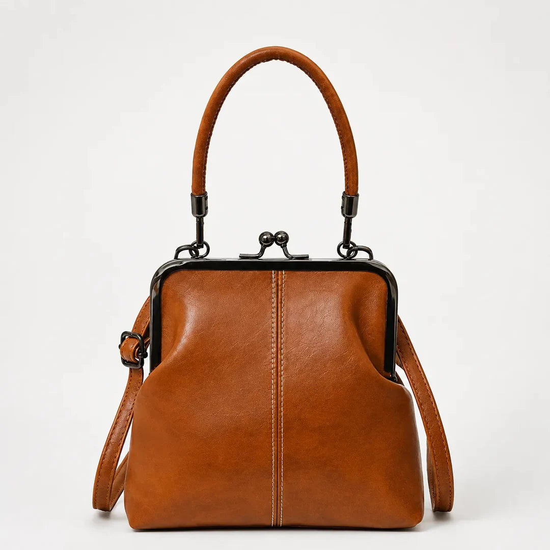 Women's vintage kiss lock crossbody bag with top handle in cognac brown