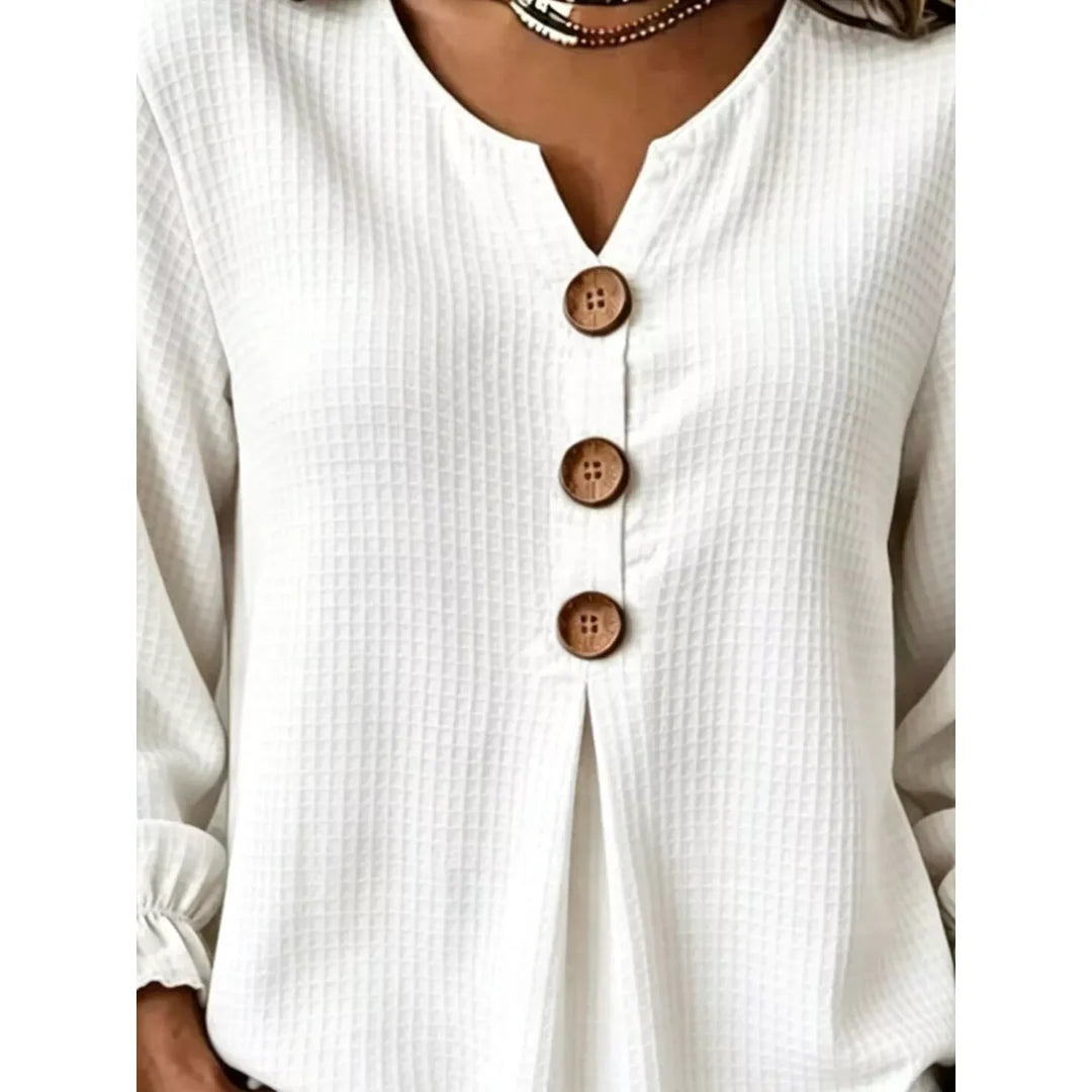Women's waffle knit long sleeve top with ruffle detail