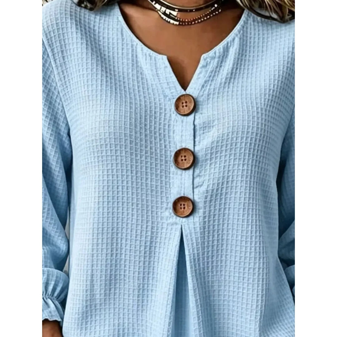 Women's waffle knit long sleeve top with ruffle detail