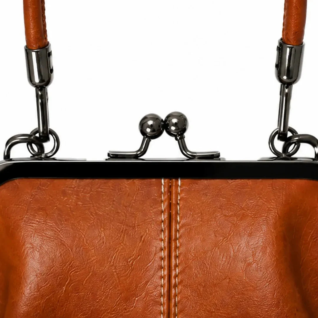 Women's vintage kiss lock crossbody bag with top handle