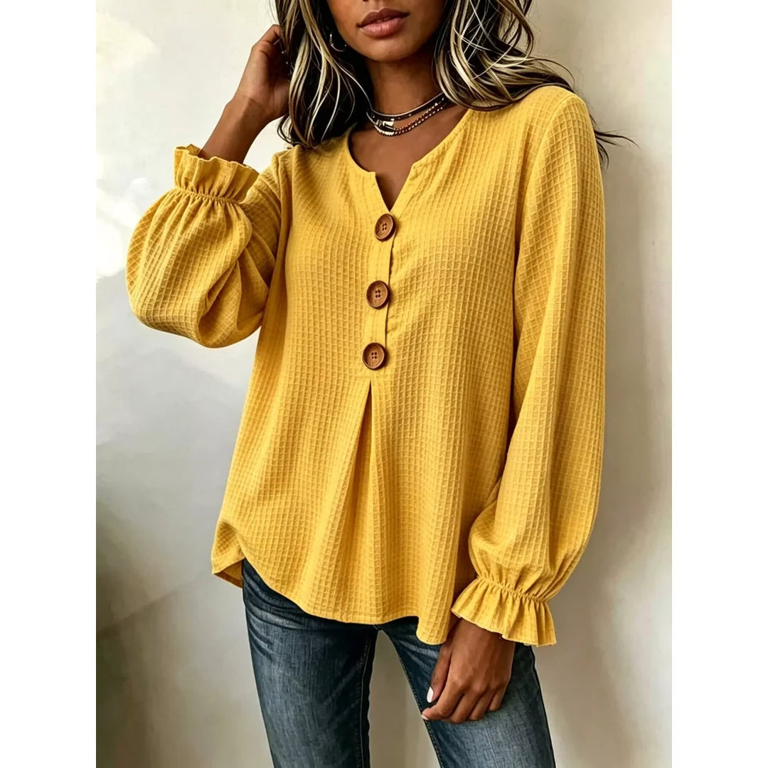 Women's waffle knit long sleeve top with ruffle detail in mustard