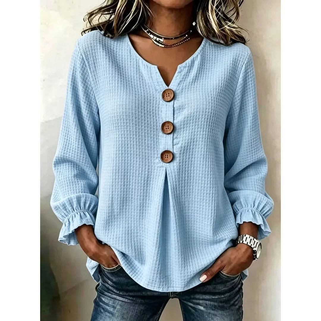 Women's waffle knit long sleeve top with ruffle detail in pastel blue