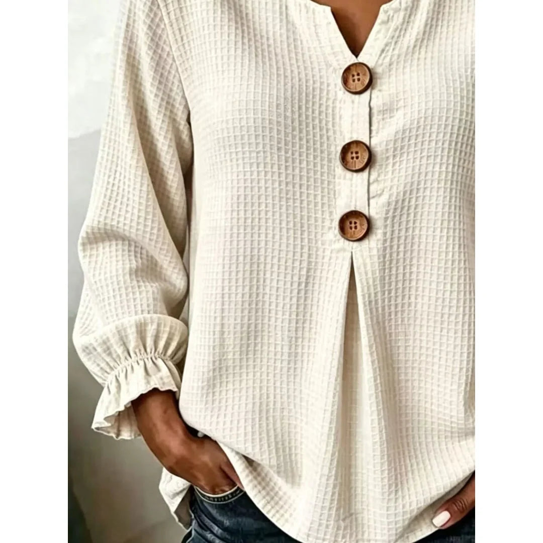 Women's waffle knit long sleeve top with ruffle detail