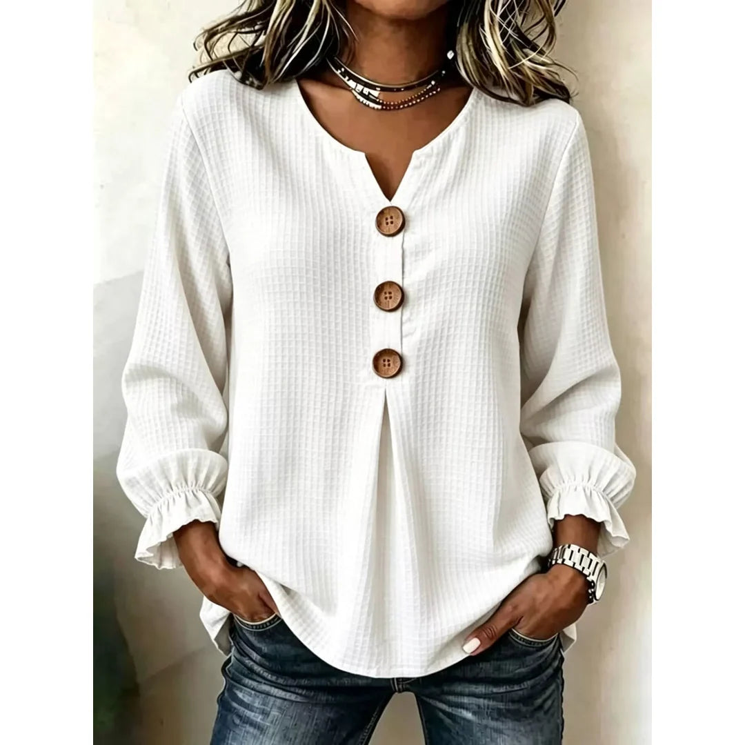 Women's waffle knit long sleeve top with ruffle detail in white